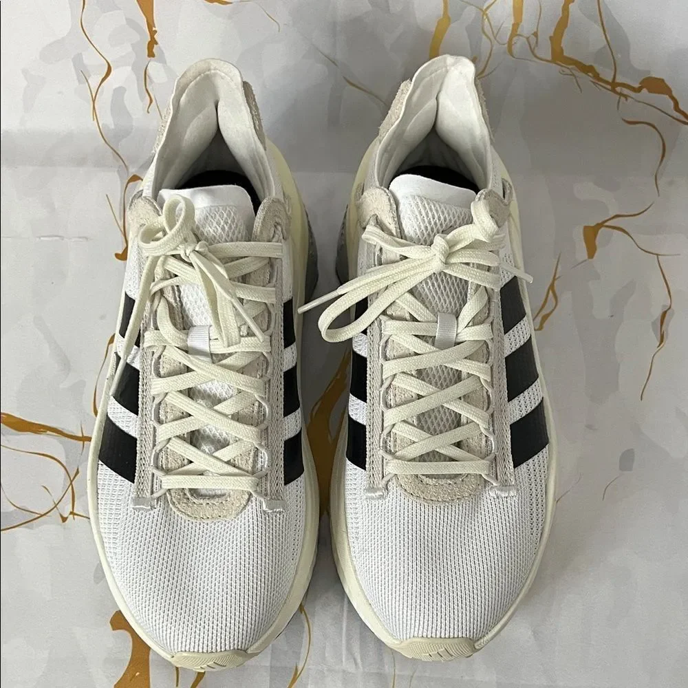 * Adidas Avryn_X sneaker in Cloud White and Core Black